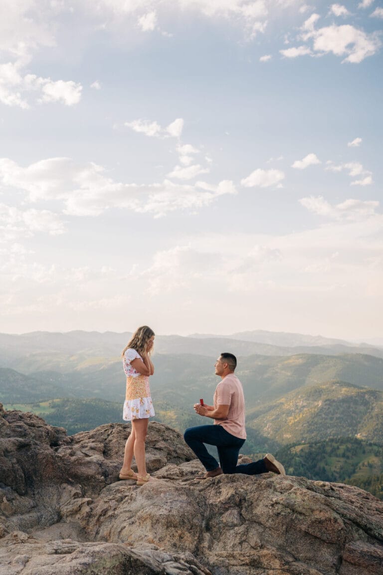 Boyfriend proposing to his girlfriend at Lost Gulch Overlook in Boulder, Colorado at sunset