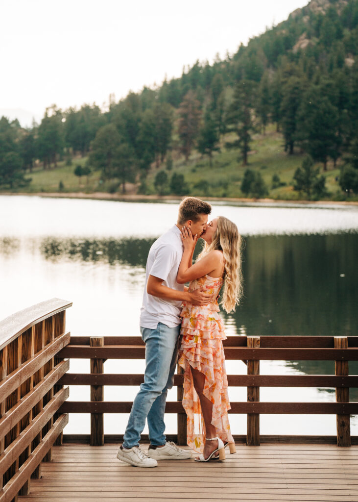boyfriend and girlfriend kissing after their proposal during their lily lake engagement photos