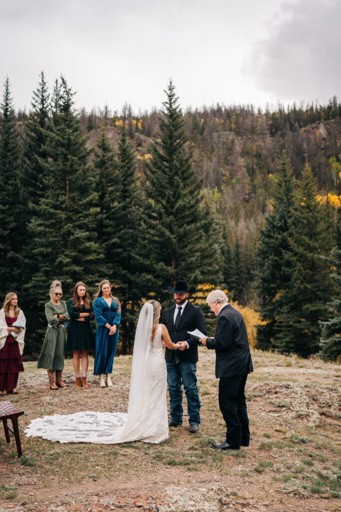 groom smiling at bride