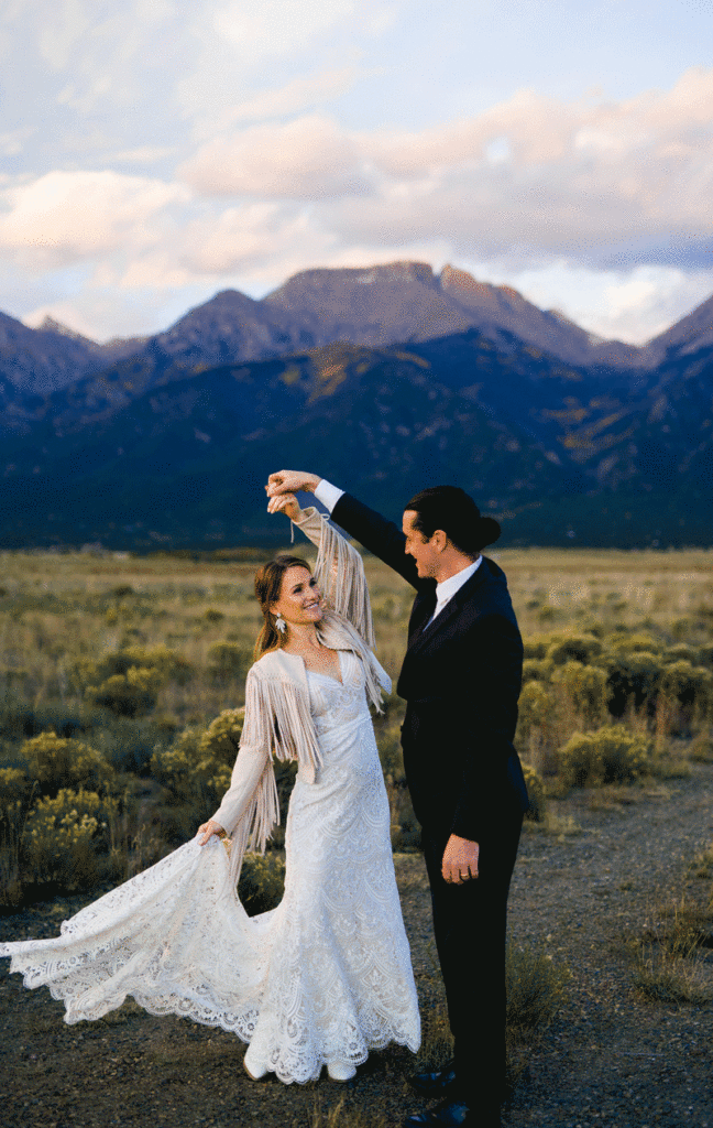 bride and groom sharing their first dance at blue hour during their colorado springs elopement