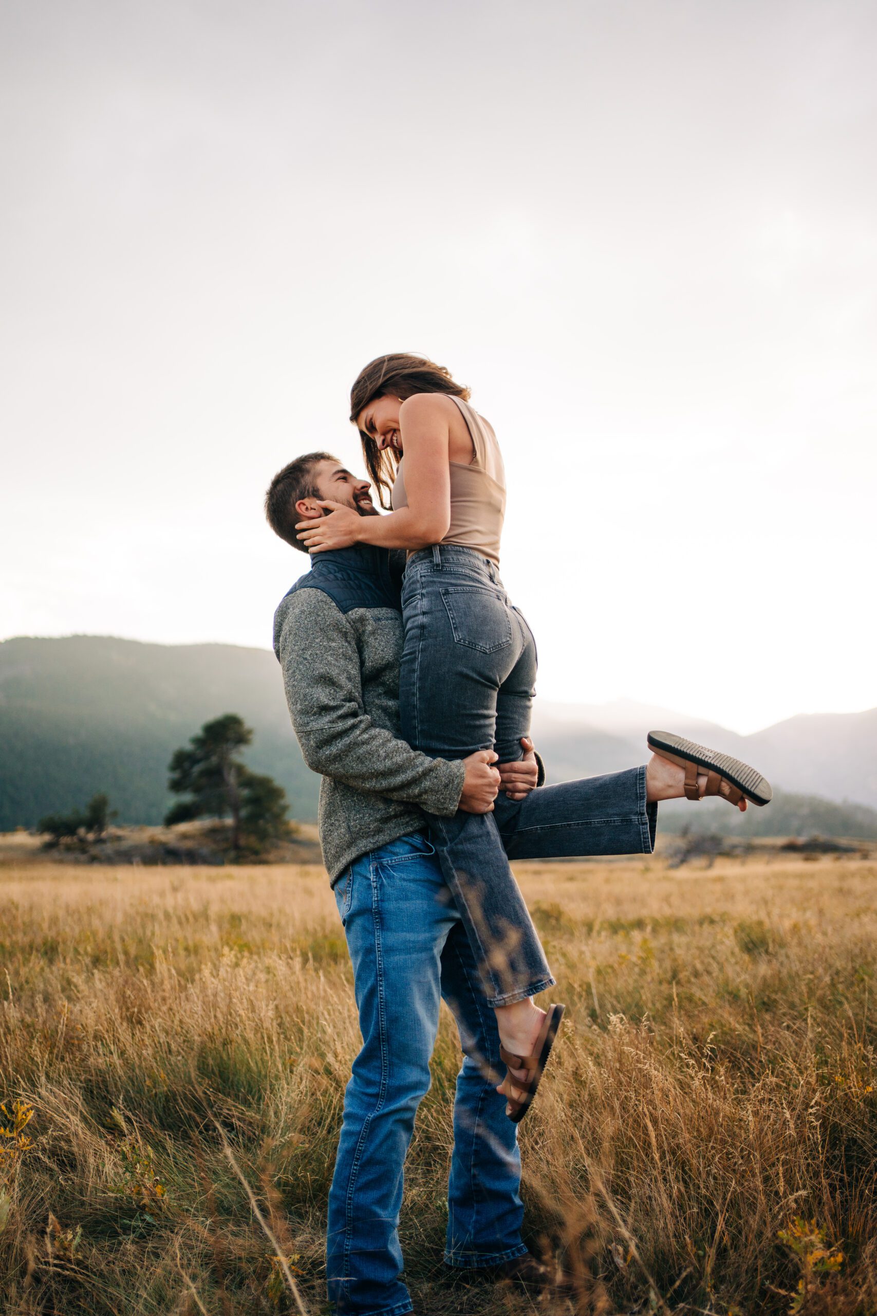 Boyfriend picking fiance up after just getting engaged in Rocky Mountain National Park