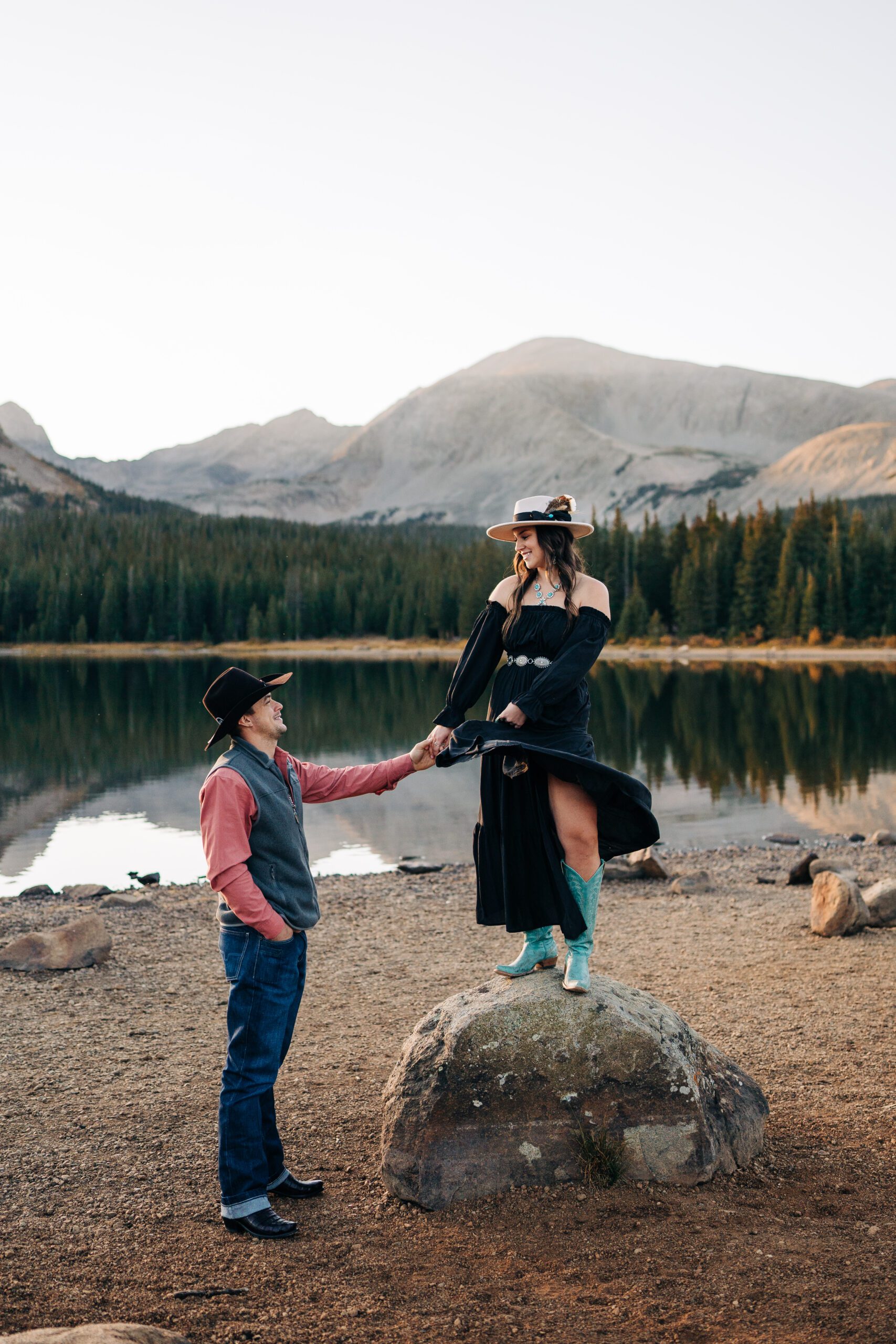 Brainard Lake engagement session in Colorado at sunset with couple holding hands