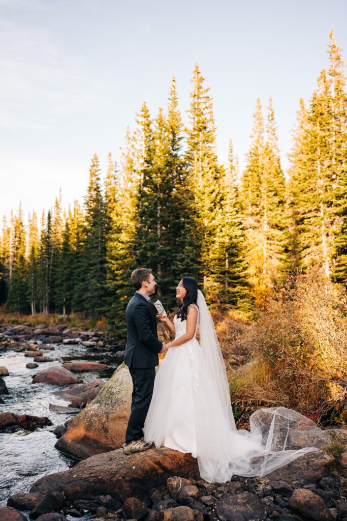 bride reading her wedding vows to her new husband during their brainard lake elopement