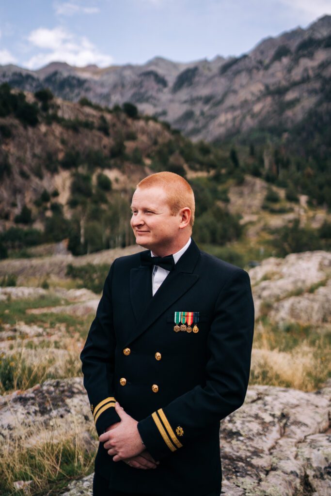 groom standing waiting for his bride during their ouray elopement in colorado 