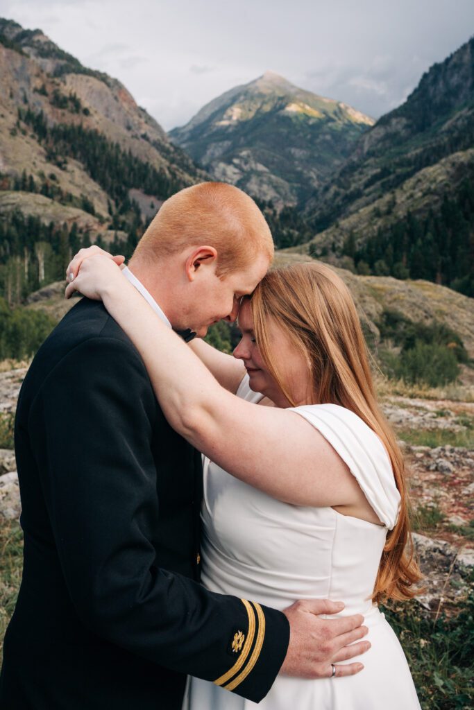 groom touching foreheads with bride during their ouray elopement in Colorado