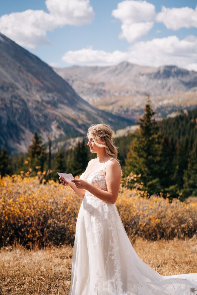 Bride reading her vows during her Breckenridge elopement