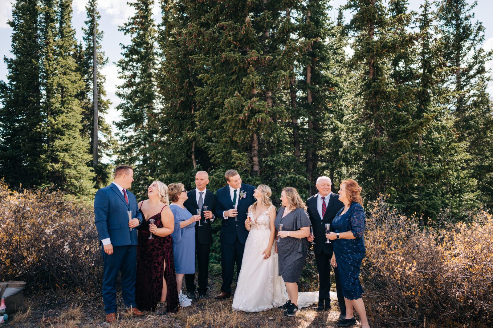 Bride and Groom toasting with their guests after their Breckenridge elopement ceremony