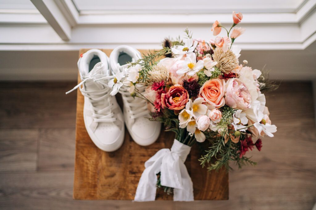 brides details: sneakers, bouquet for her Telluride elopement