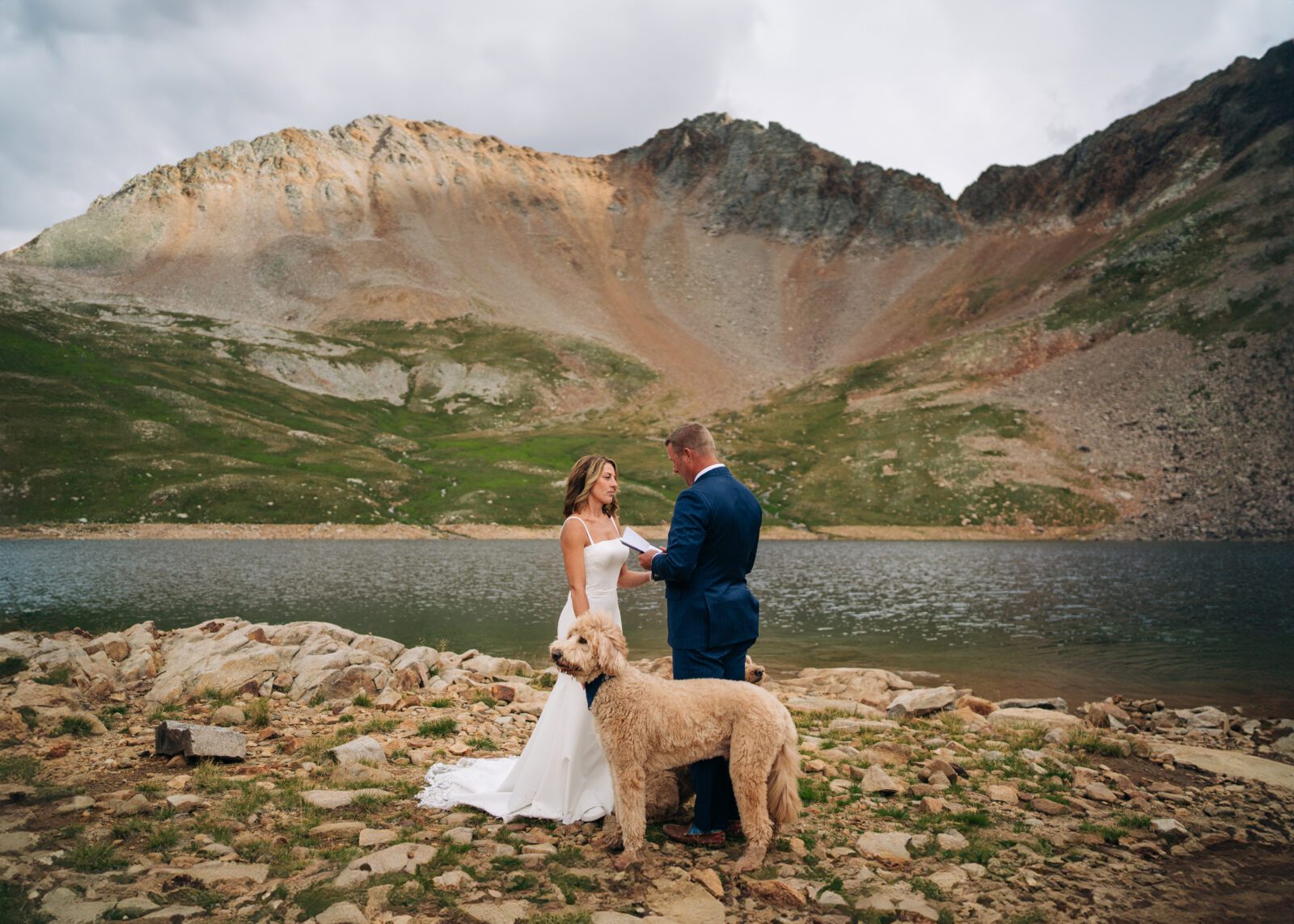 Groom reading vows to his bride at Hope Lake during their Telluride elopement