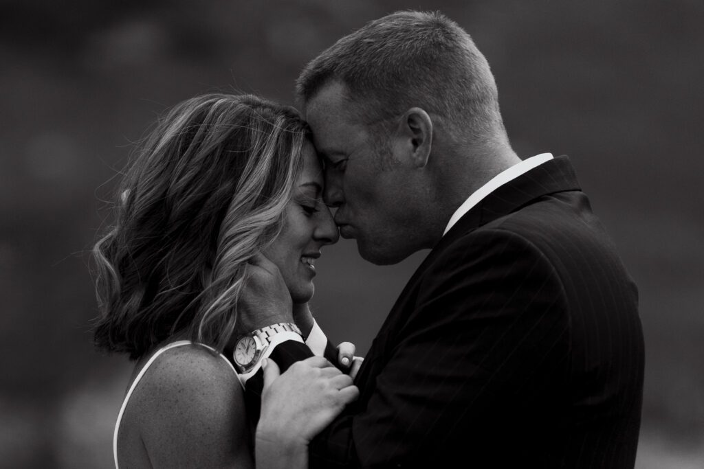 Groom kissing brides nose during their Telluride elopement