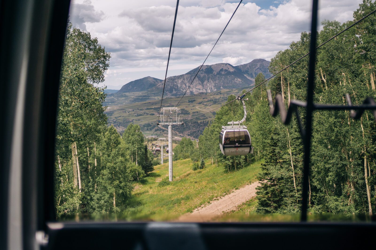 Photo looking out the Telluride gondola during Megan and Matt's Telluride elopement